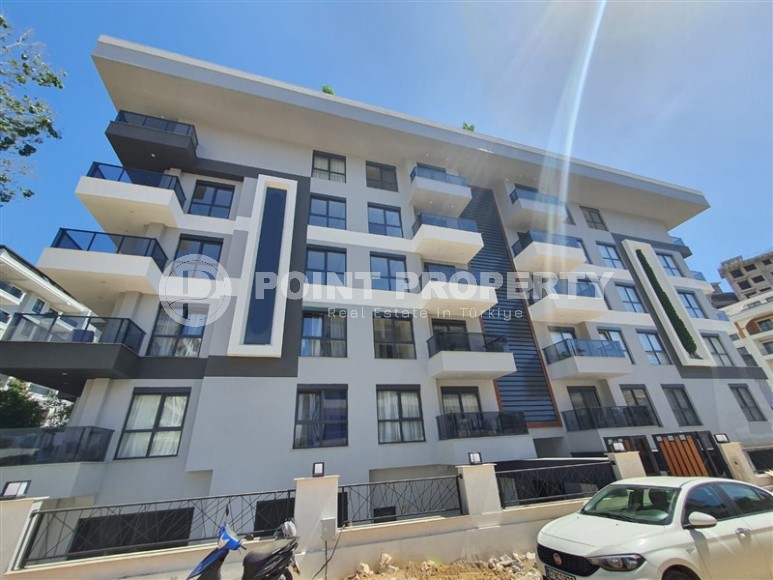 Небольшая новая квартира с чистовой отделкой в 650 метрах от моря, в центре популярного района Аланьи - Махмутлар-id-7310-фото-1