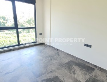 Небольшая новая квартира с чистовой отделкой в 650 метрах от моря, в центре популярного района Аланьи - Махмутлар-id-7310-фото-4