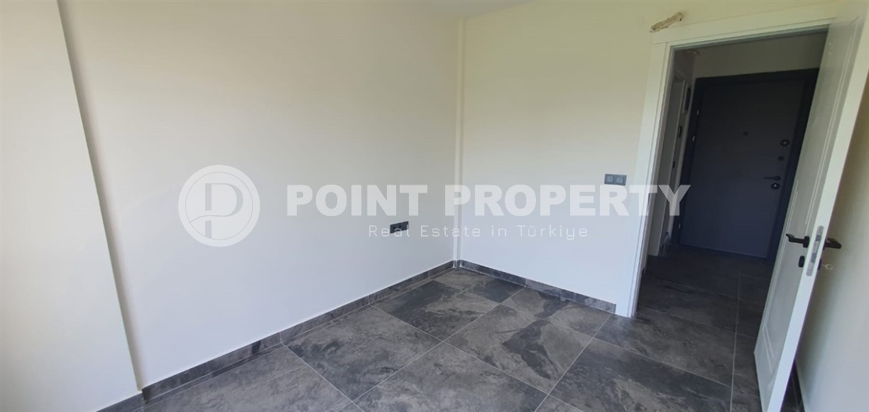 Небольшая новая квартира с чистовой отделкой в 650 метрах от моря, в центре популярного района Аланьи - Махмутлар-id-7310-фото-6