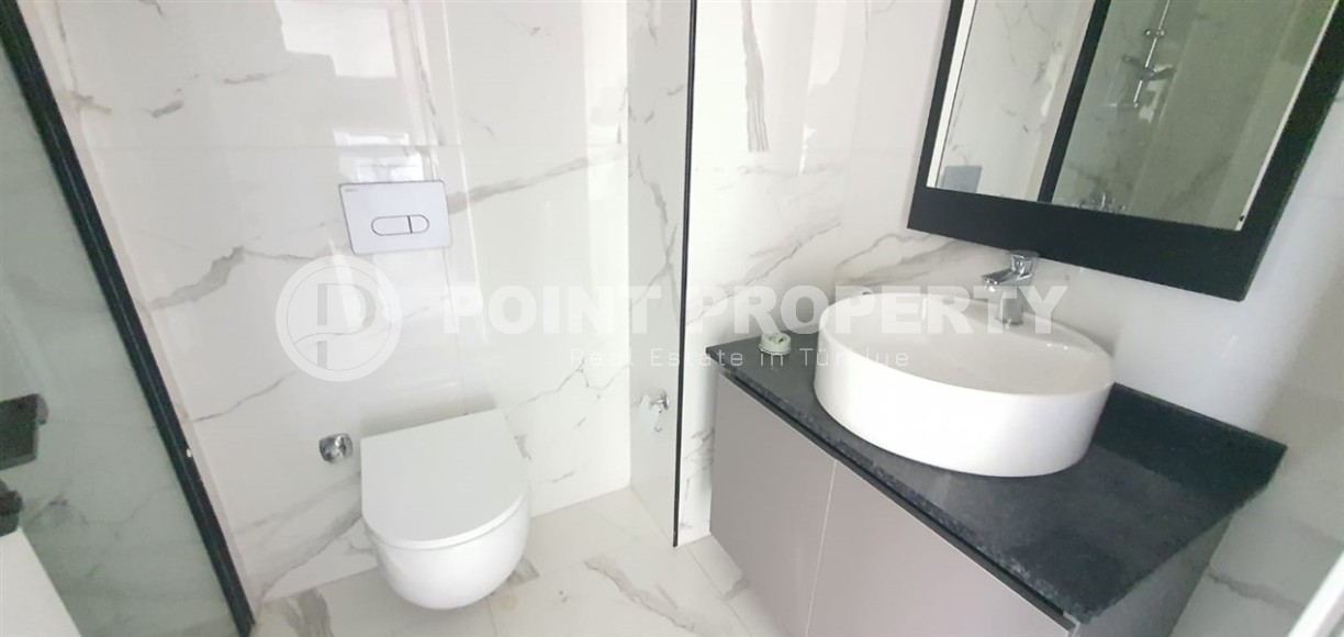 Небольшая новая квартира с чистовой отделкой в 650 метрах от моря, в центре популярного района Аланьи - Махмутлар-id-7310-фото-7