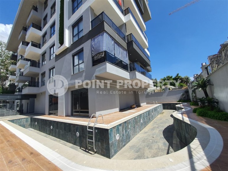 Небольшая новая квартира с чистовой отделкой в 650 метрах от моря, в центре популярного района Аланьи - Махмутлар-id-7310-фото-15