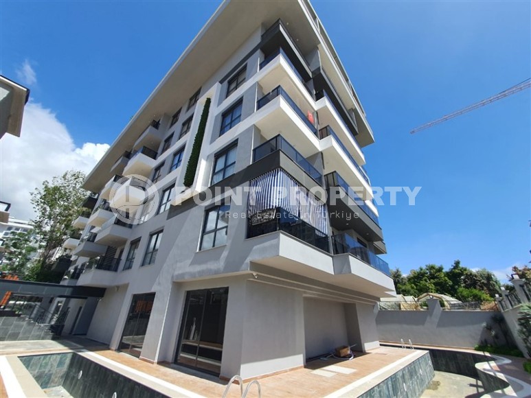 Небольшая новая квартира с чистовой отделкой в 650 метрах от моря, в центре популярного района Аланьи - Махмутлар-id-7310-фото-16