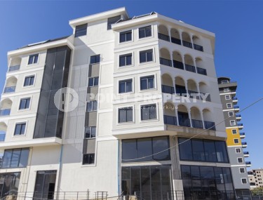 Bright apartment in a new complex in Mahmutlar!-id-8288-photo-1