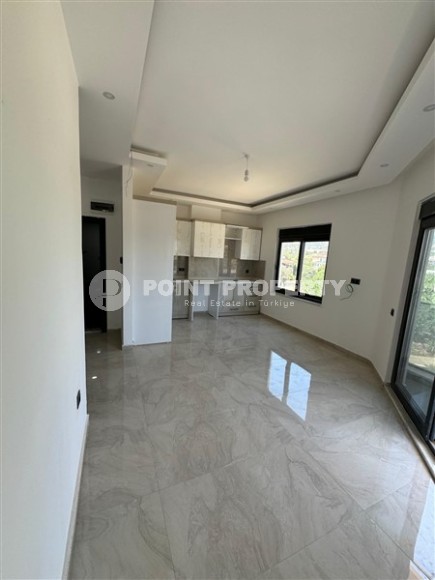 Светлая квартира в новом комплексе в Махмутларе!-id-8288-фото-2