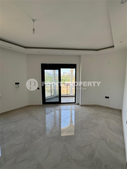 Светлая квартира в новом комплексе в Махмутларе!-id-8288-фото-6