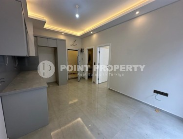 Доступная по цене новая квартира в центре Аланьи – Хасбахче-id-8301-фото-4