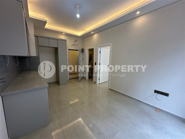 Доступная по цене новая квартира в центре Аланьи – Хасбахче-id-8301-фото-4