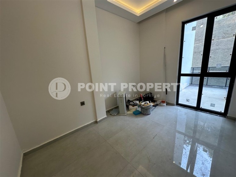 Доступная по цене новая квартира в центре Аланьи – Хасбахче-id-8301-фото-7