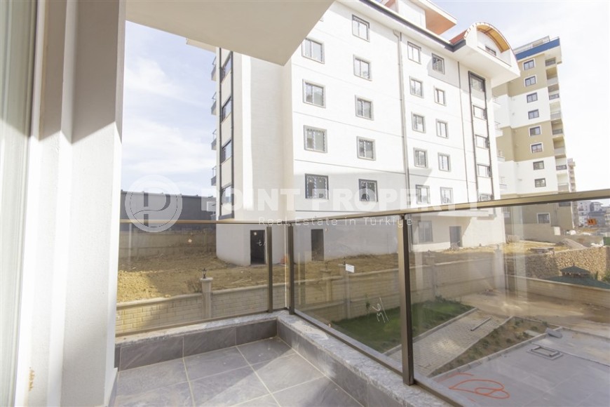 Современная квартира 55 кв.м в новом комплексе в Авсалларе-id-8306-фото-9