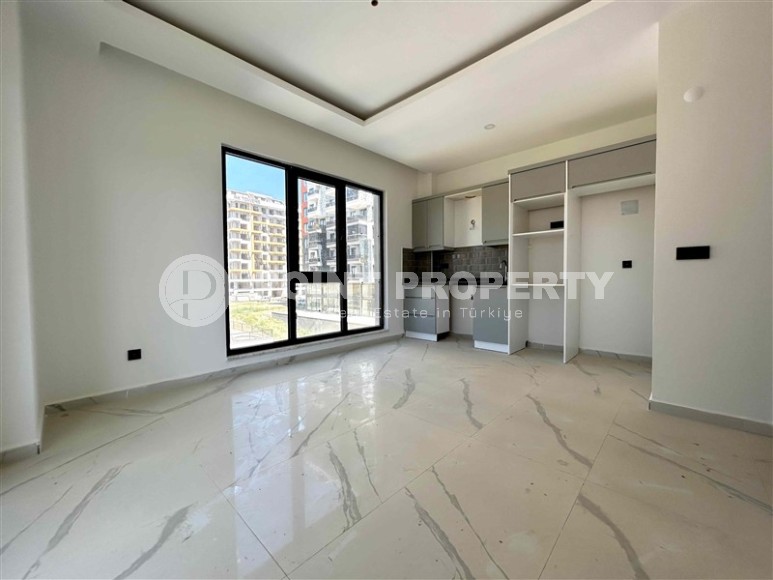 New house with infrastructure in Mahmutlar area-id-8312-photo-4