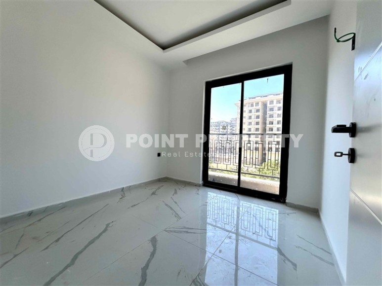 New house with infrastructure in Mahmutlar area-id-8312-photo-6