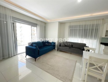 Просторная квартира с двумя балконами в Махмутларе-id-8317-фото-2