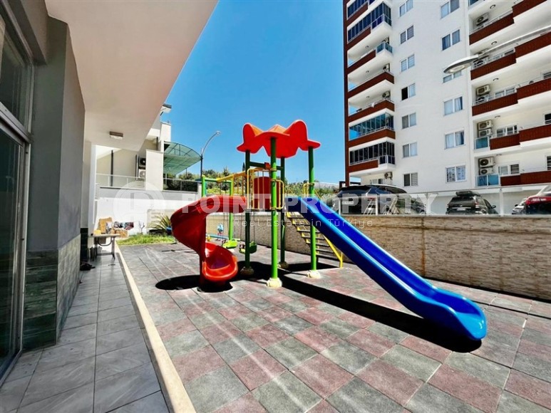 Просторная квартира с двумя балконами в Махмутларе-id-8317-фото-16