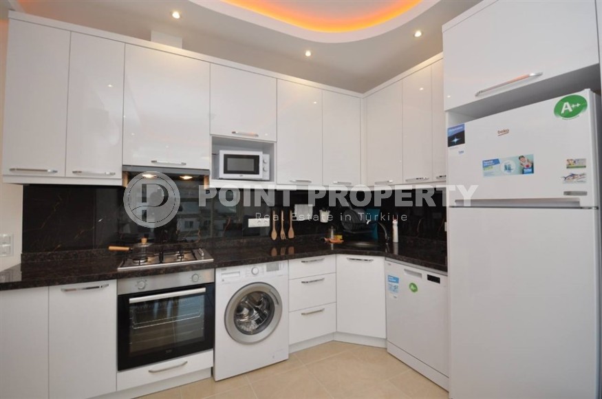 Просторная квартира 65 кв.м в премиальном комплексе в Махмутларе-id-8318-фото-4