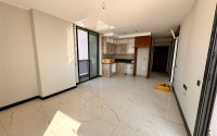 Three apartments in a new building with sea view in Mahmutlar-id-8321-photo-4