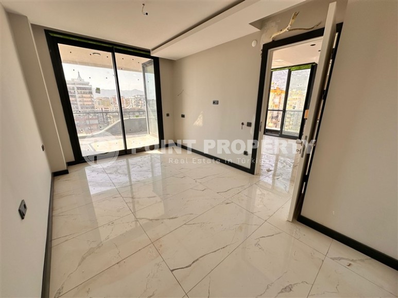 Three apartments in a new building with sea view in Mahmutlar-id-8321-photo-5