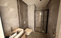 Три квартиры в новом доме с видом на море в Махмутларе-id-8321-фото-7