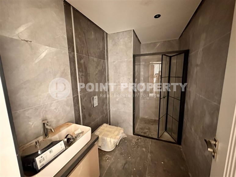 Three apartments in a new building with sea view in Mahmutlar-id-8321-photo-7