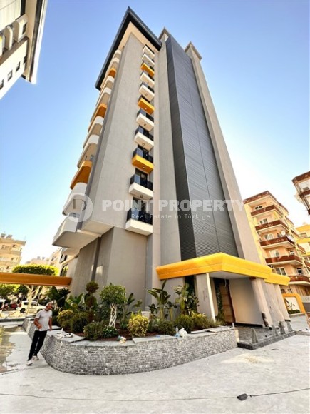 Three apartments in a new building with sea view in Mahmutlar-id-8321-photo-11