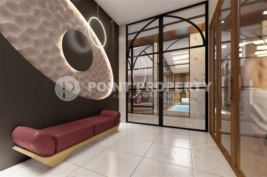 Three apartments in a new building with sea view in Mahmutlar-id-8321-photo-14