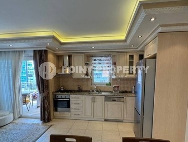 Квартира 2+1 с боковым видом на море в Махмутларе-id-8327-фото-2