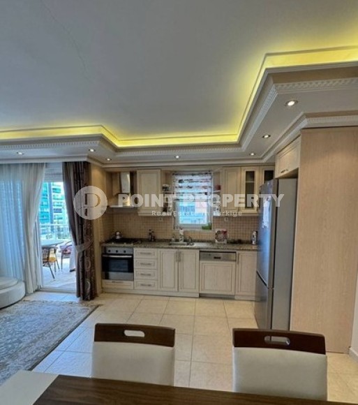 2+1 apartment with side sea view in Mahmutlar-id-8327-photo-2