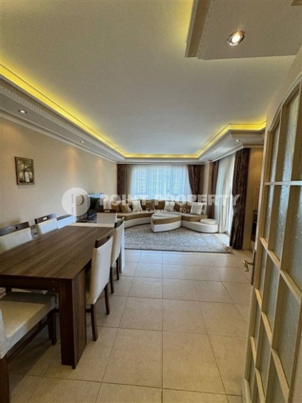 2+1 apartment with side sea view in Mahmutlar-id-8327-photo-3