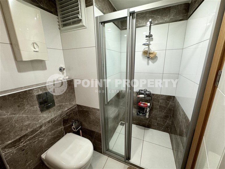 Квартира в центральной части Алании в одном из лучших проектов района Джикджилли-id-8330-фото-9