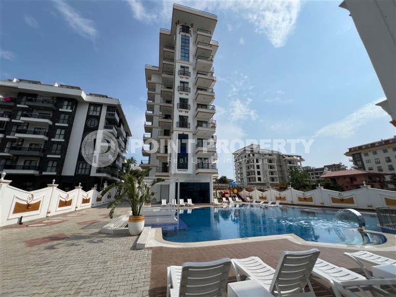 Просторные квартиры 1+1 в новом комплексе в районе Махмутлар-id-8332-фото-13