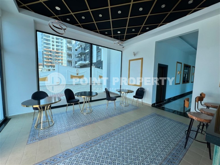 Просторные квартиры 1+1 в новом комплексе в районе Махмутлар-id-8332-фото-14