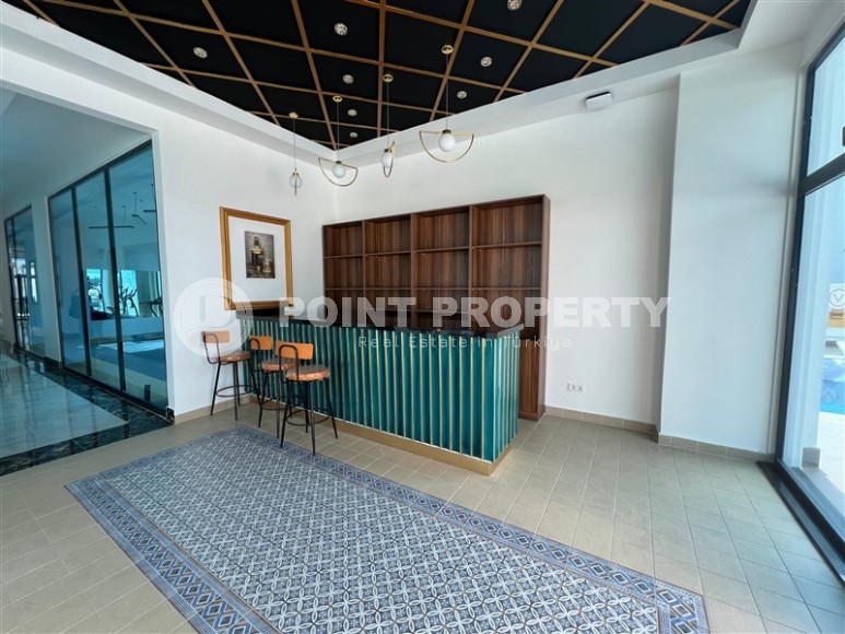 Просторные квартиры 1+1 в новом комплексе в районе Махмутлар-id-8332-фото-16