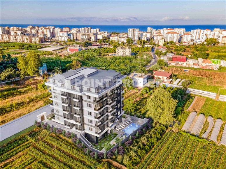 Two-room apartment, 55m², in a complex at the final stage of construction, in Mahmutlar, Alanya-id-1658-photo-2