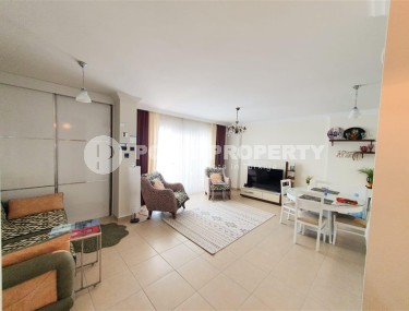 Просторная квартира 70 м² в центре популярного района Махмутлар-id-8349-фото-3