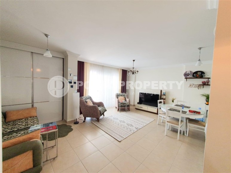 Просторная квартира 70 м² в центре популярного района Махмутлар-id-8349-фото-3