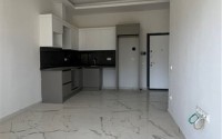 Квартира 1+1 в новом комплексе Махмутлара-id-8355-фото-3