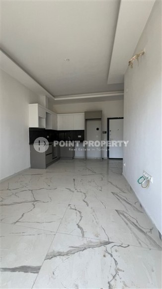 Квартира 1+1 в новом комплексе Махмутлара-id-8355-фото-3