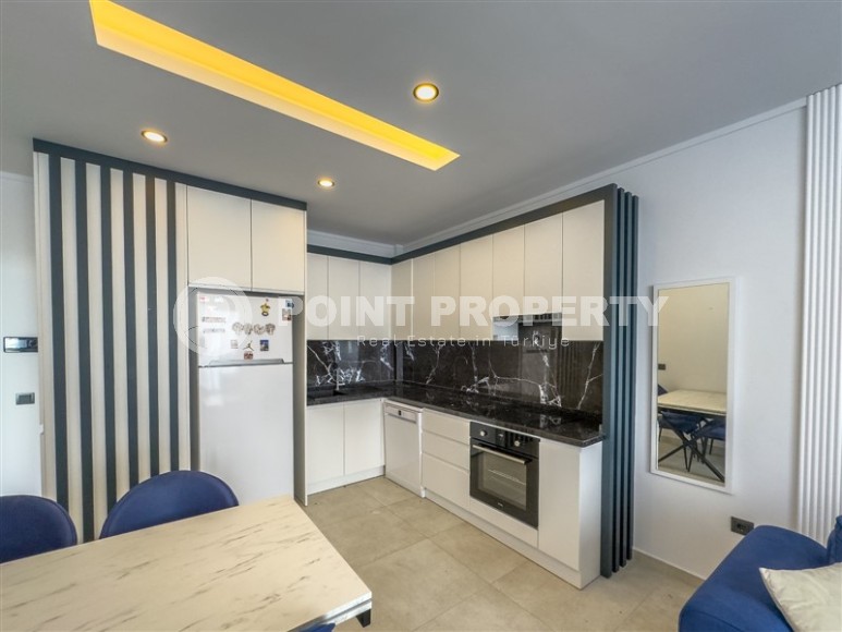 Furnished new apartment 55 m² in the center of Alanya!-id-8358-photo-4