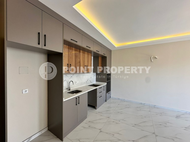 Современная квартира 51 м² в новом комплексе в Махмутларе-id-8363-фото-2