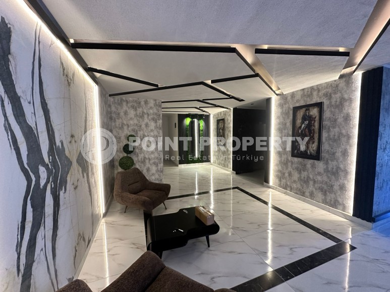 Современная квартира 51 м² в новом комплексе в Махмутларе-id-8363-фото-10