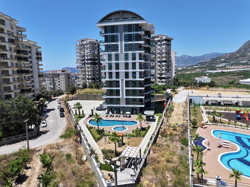 Просторная квартира 60 м² в комплексе с полной инфраструктурой в Махмутларе-id-8372-фото-2