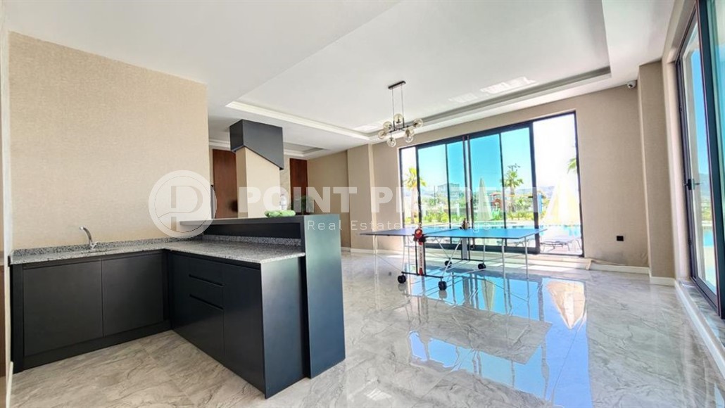 Просторная квартира 60 м² в комплексе с полной инфраструктурой в Махмутларе-id-8372-фото-7