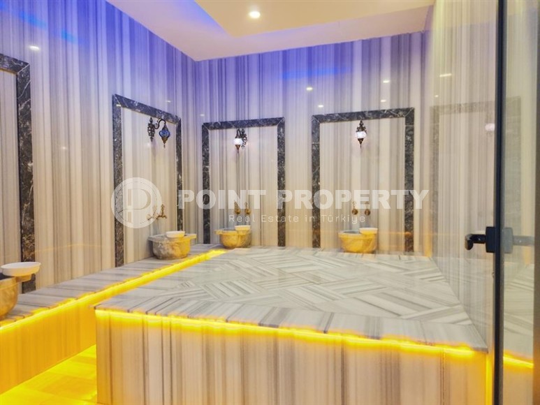 Просторная квартира 60 м² в комплексе с полной инфраструктурой в Махмутларе-id-8372-фото-14