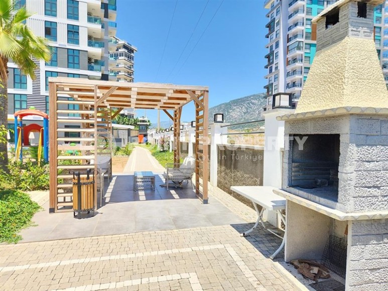 Просторная квартира 60 м² в комплексе с полной инфраструктурой в Махмутларе-id-8372-фото-17