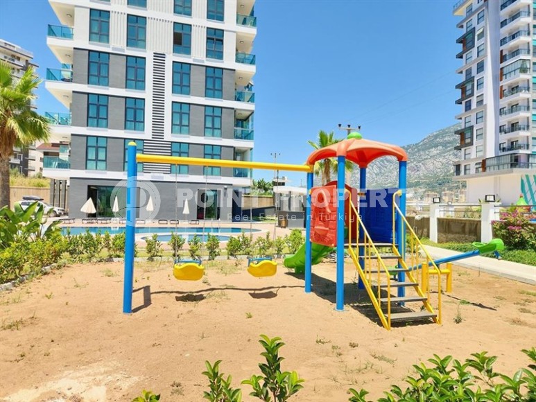 Просторная квартира 60 м² в комплексе с полной инфраструктурой в Махмутларе-id-8372-фото-18