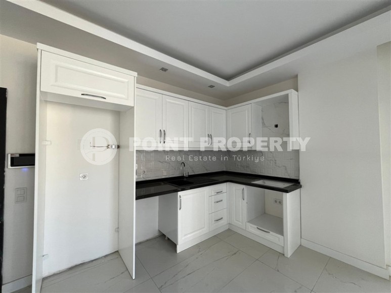 Новый дом с развитой инфраструктурой в районе Махмутлар-id-8380-фото-3