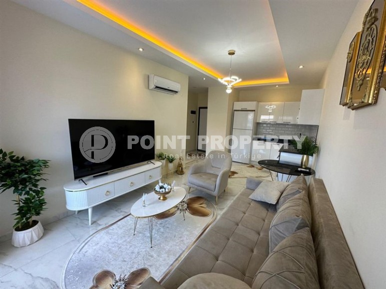 Квартира 1+1 с боковым видом на море в районе Кестель-id-8387-фото-3