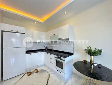 Квартира 1+1 с боковым видом на море в районе Кестель-id-8387-фото-5