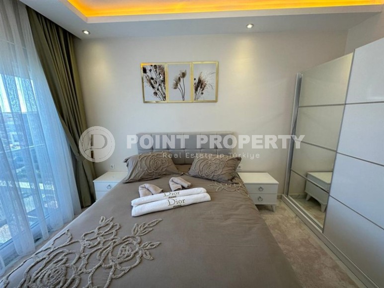 Квартира 1+1 с боковым видом на море в районе Кестель-id-8387-фото-6