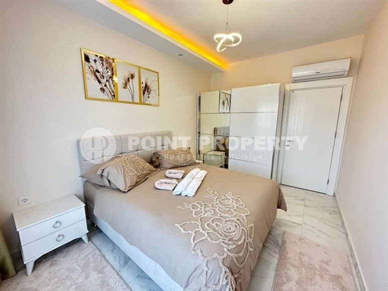 Квартира 1+1 с боковым видом на море в районе Кестель-id-8387-фото-7