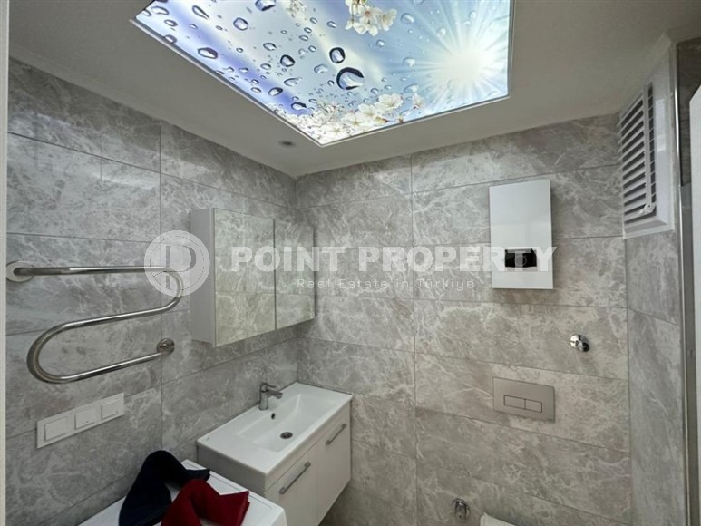 Квартира 1+1 с боковым видом на море в районе Кестель-id-8387-фото-9